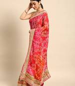 Pink bandhani saree with lace border and unstitched blouse piece