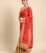 Beige bandhani saree with lace border and unstitched blouse piece