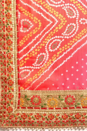 Yellow bandhani saree with lace border and unstitched blouse piece