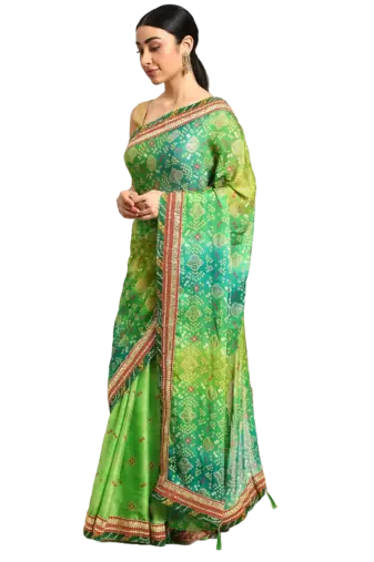 Green bandhani saree with lace border and unstitched blouse piece