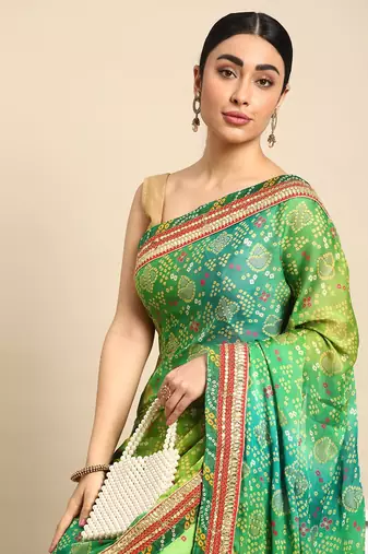 Green bandhani saree with lace border and unstitched blouse piece