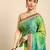 Green bandhani saree with lace border and unstitched blouse piece