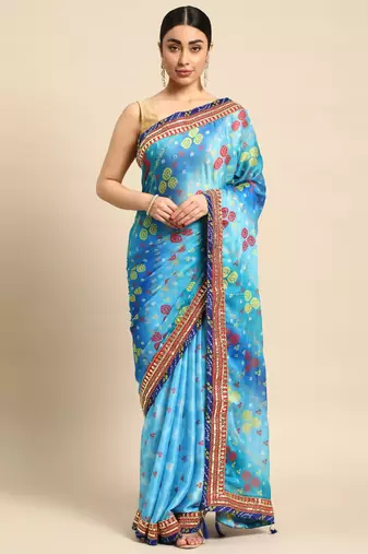 Blue bandhani saree with lace border and unstitched blouse piece