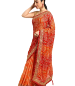 Orange bandhani saree with lace border and unstitched blouse piece