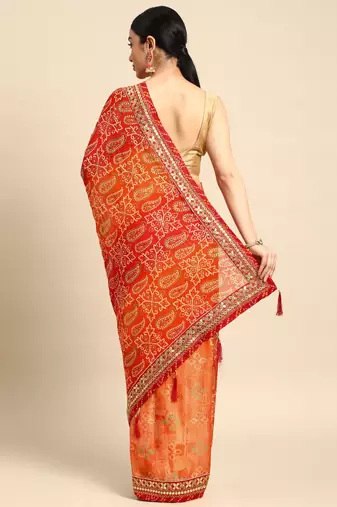 Orange bandhani saree with lace border and unstitched blouse piece