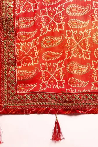Orange bandhani saree with lace border and unstitched blouse piece