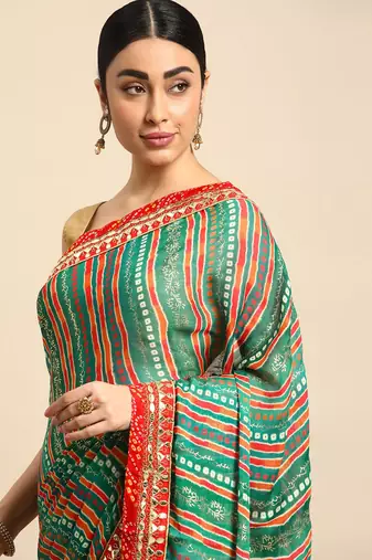 Blue bandhani saree with lace border and unstitched blouse piece