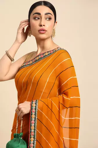 Yellow leheriya saree with lace border and  unstitched blouse piece