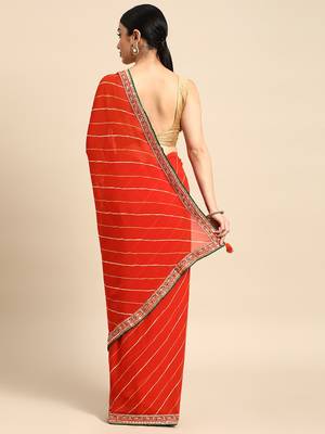 Orange leheriya saree with lace border and  unstitched blouse piece 2