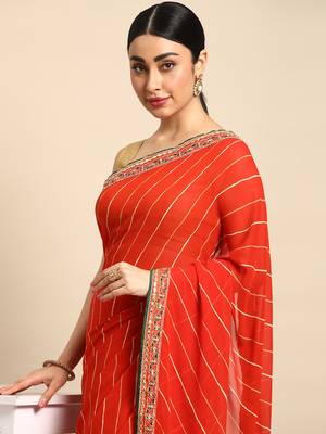 Orange leheriya saree with lace border and  unstitched blouse piece 3