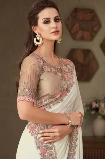White floral embroidered shimmer silk saree with embroidered blouse