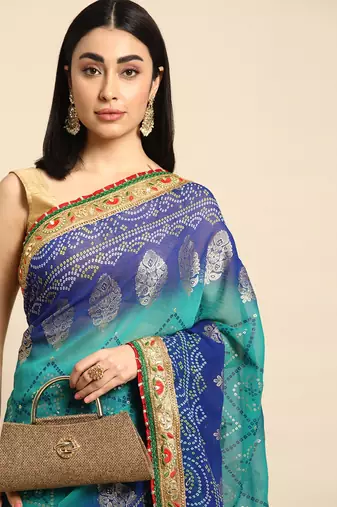 Blue  bandhani saree with lace border and unstitched blouse piece