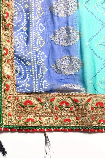 Blue  bandhani saree with lace border and unstitched blouse piece
