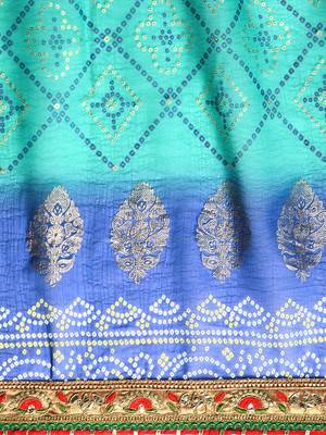 Blue  bandhani saree with lace border and unstitched blouse piece 5
