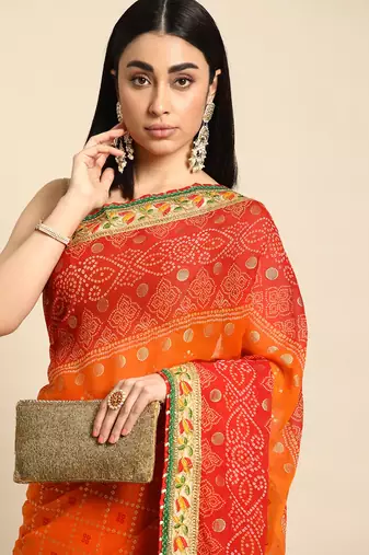 Red  bandhani saree with lace border and unstitched blouse piece