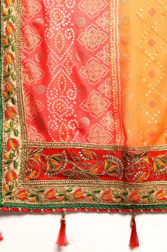 Red  bandhani saree with lace border and unstitched blouse piece