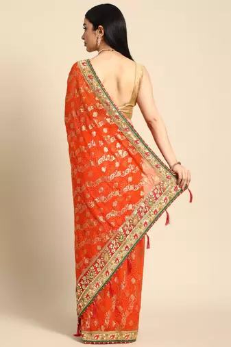 Orange bandhani saree with lace border and unstitched blouse piece