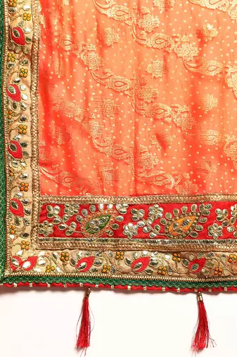 Orange bandhani saree with lace border and unstitched blouse piece