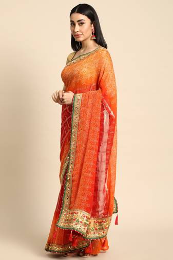 Orange bandhani saree with lace border and unstitched blouse piece