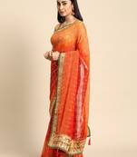 Orange bandhani saree with lace border and unstitched blouse piece