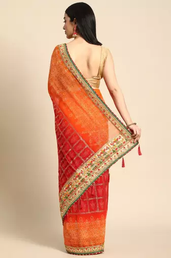Orange bandhani saree with lace border and unstitched blouse piece
