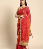 Red  bandhani saree with lace border and unstitched blouse piece