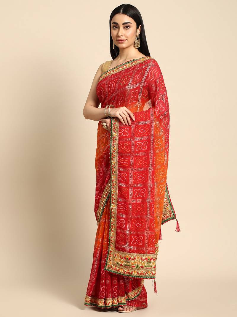 Red  bandhani saree with lace border and unstitched blouse piece