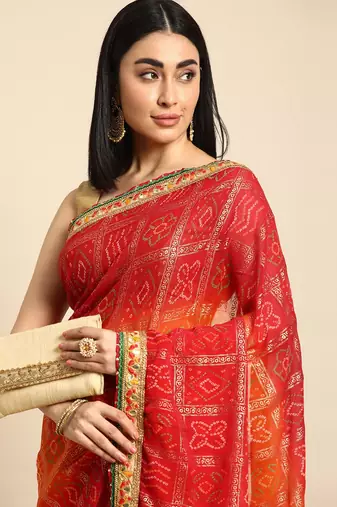 Red  bandhani saree with lace border and unstitched blouse piece