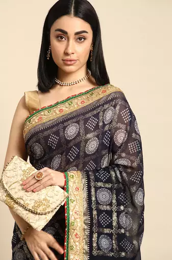 Navy blue  bandhani saree with lace border and unstitched blouse piece