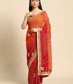 Blue  bandhani saree with lace border and unstitched blouse piece