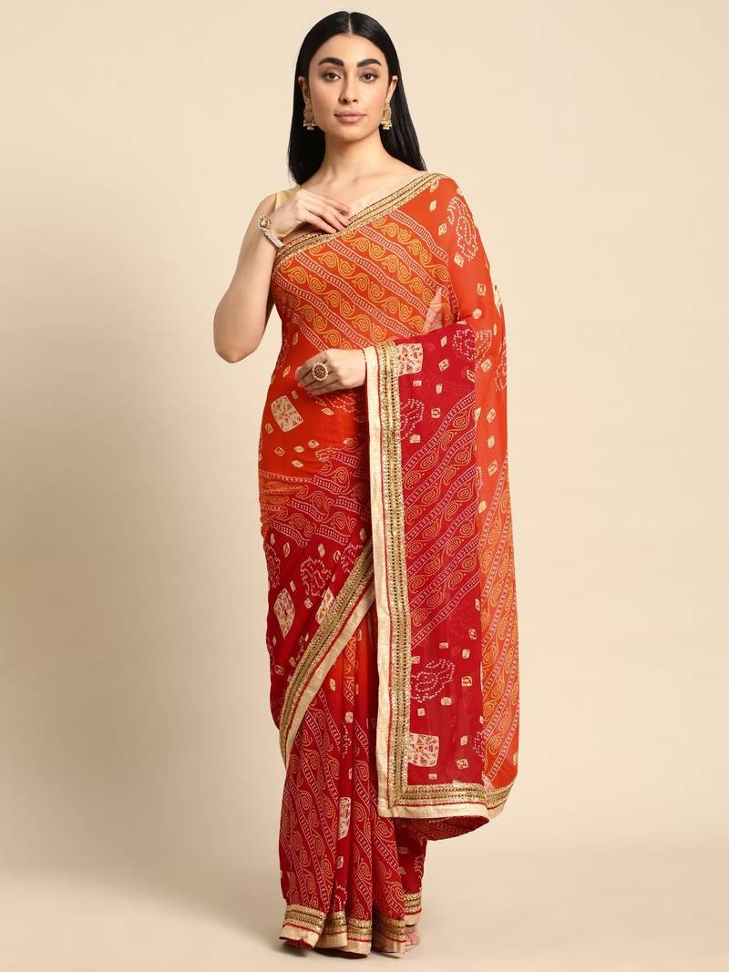 Blue  bandhani saree with lace border and unstitched blouse piece