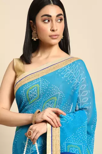 Orange bandhani saree with lace border and unstitched blouse piece