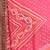 Pink bandhani saree with lace border and unstitched blouse piece