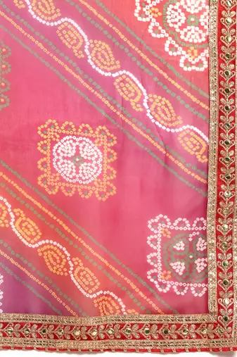 Green bandhani saree with lace border and unstitched blouse piece
