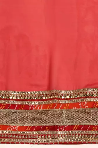 Red bandhani saree with lace border and unstitched blouse piece