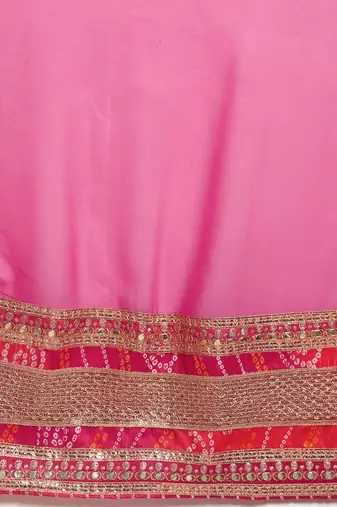 Pink bandhani saree with lace border and unstitched blouse piece