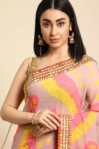 Pink bandhani saree with lace border and unstitched blouse piece