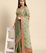 Green bandhani saree with lace border and unstitched blouse piece