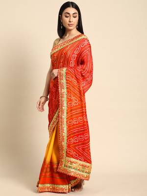 Yellow bandhani saree with lace border and unstitched blouse piece 1