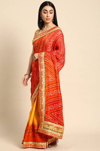 Yellow bandhani saree with lace border and unstitched blouse piece