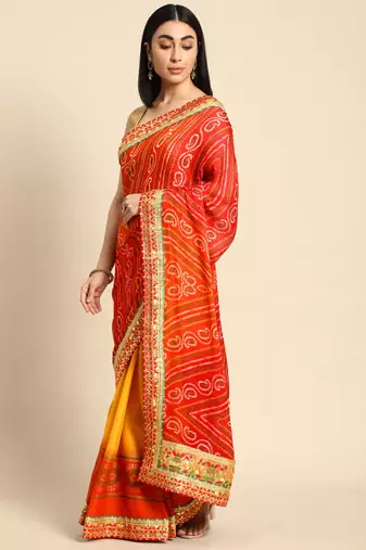 Yellow bandhani saree with lace border and unstitched blouse piece