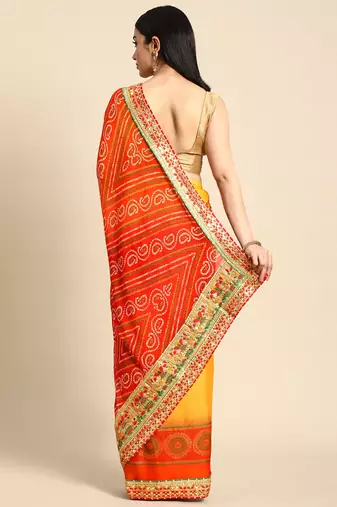 Yellow bandhani saree with lace border and unstitched blouse piece