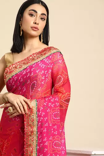 Pink bandhani saree with lace border and unstitched blouse piece