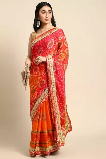 Orange bandhani saree with lace border and unstitched blouse piece