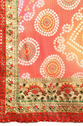 Orange bandhani saree with lace border and unstitched blouse piece