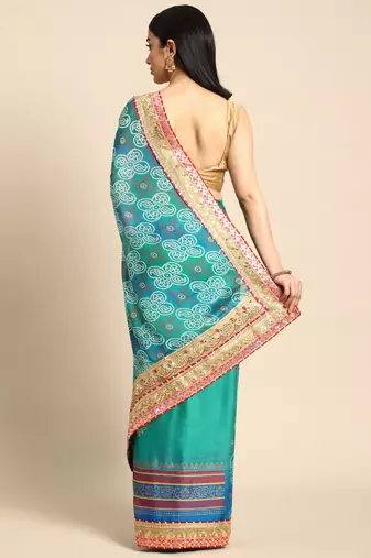 Blue bandhani saree with lace border and unstitched blouse piece