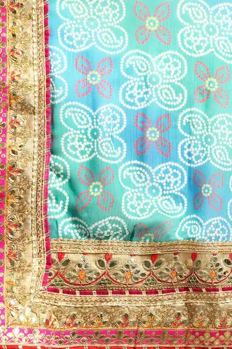 Blue bandhani saree with lace border and unstitched blouse piece