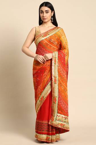 Pink bandhani saree with lace border and unstitched blouse piece