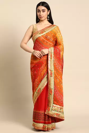 Pink bandhani saree with lace border and unstitched blouse piece