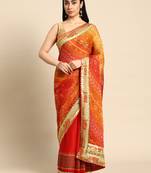 Pink bandhani saree with lace border and unstitched blouse piece